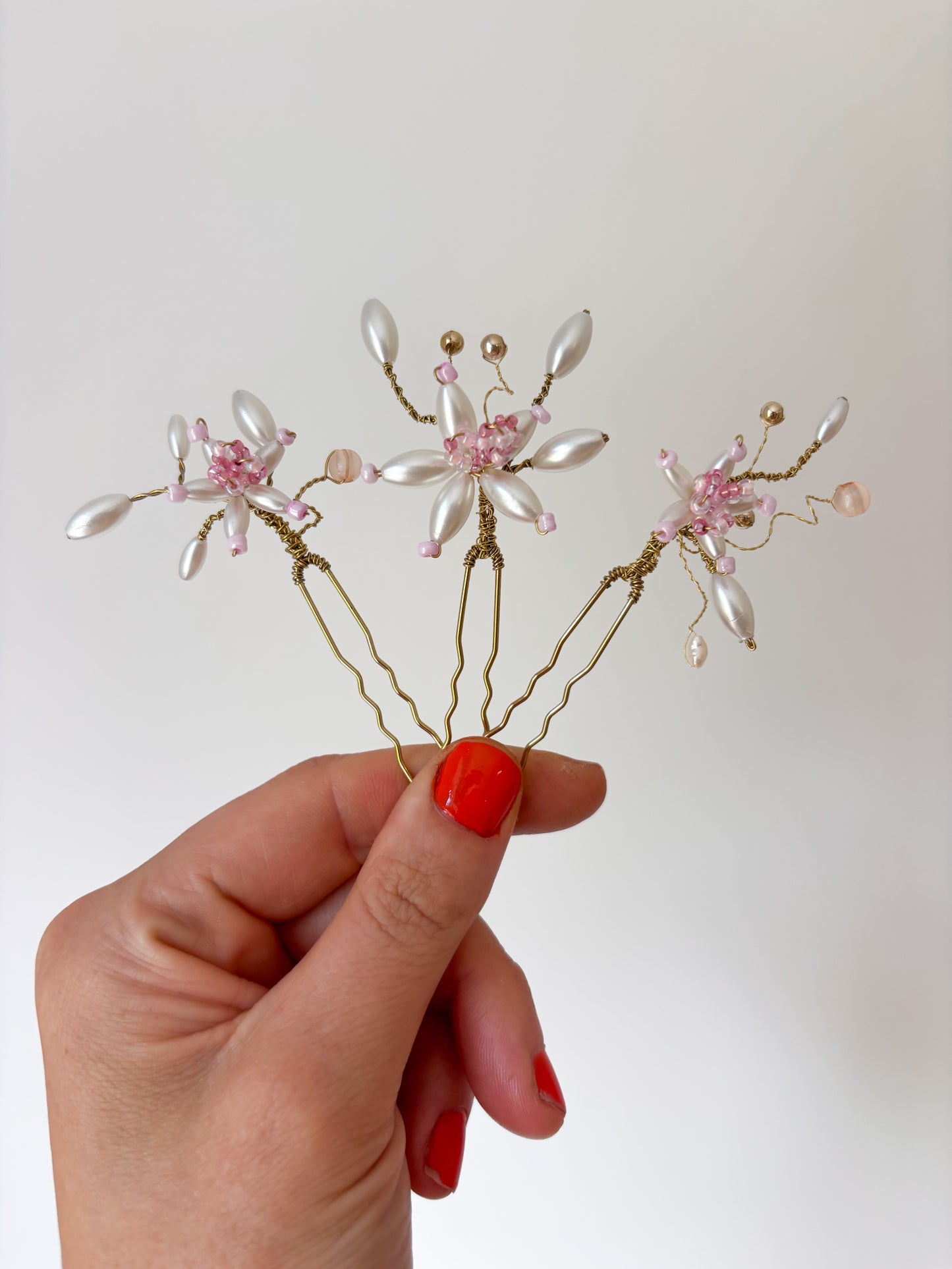 Three hair pins in a blush pink